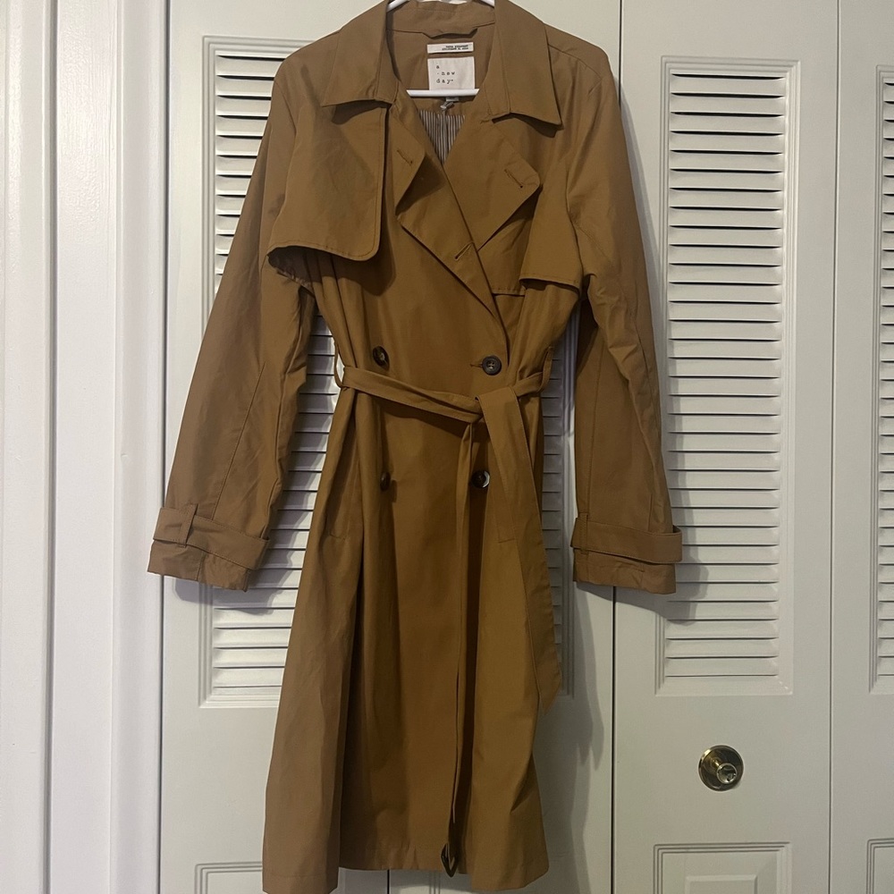 Tan raincoat with belt